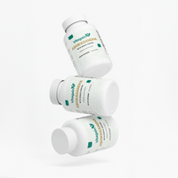 Three white supplement bottles labeled Vitagain Ashwagandha floating in a stacked arrangement against a clean white background.